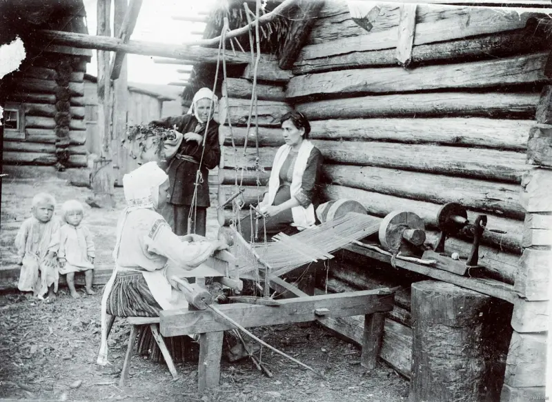 A peasant woman at a loom