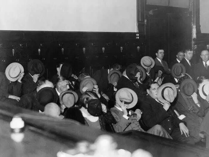 Gangsters Hiding Their Faces during Al Capone's Trial