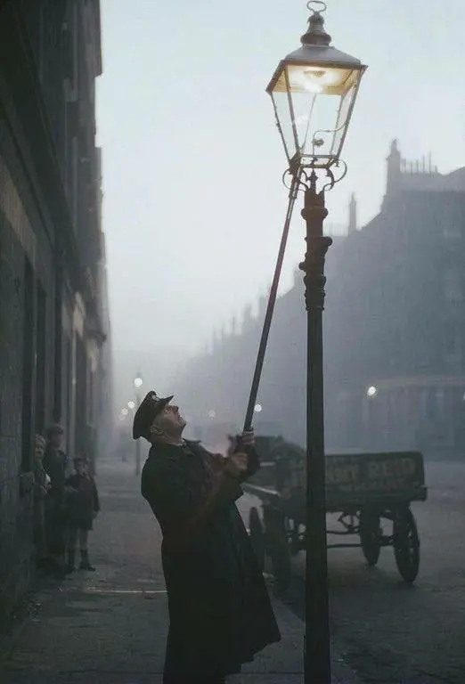 Lamplighter Lighting Gas Lamp on Glasgow Street