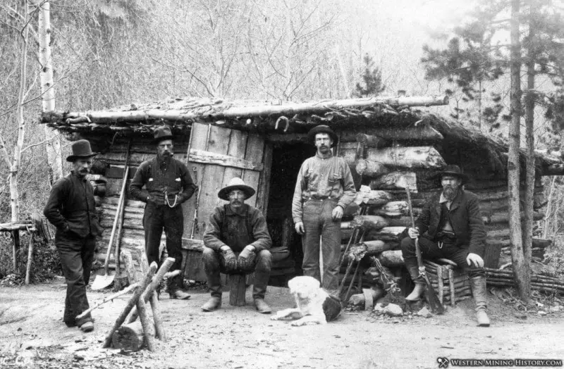 Gold miners at their Colorado cabin