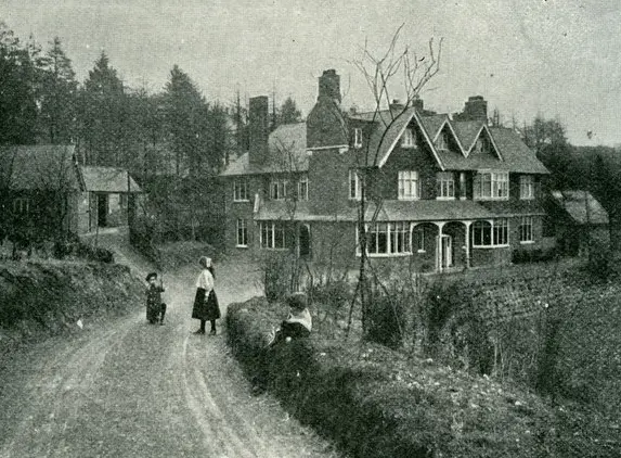 Façade of Undershaw with Doyle's children, Mary and Kingsley, on the drive