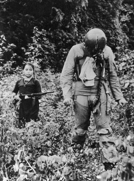 Captured US Air Force Lieutenant with North Vietnamese Girl Soldier