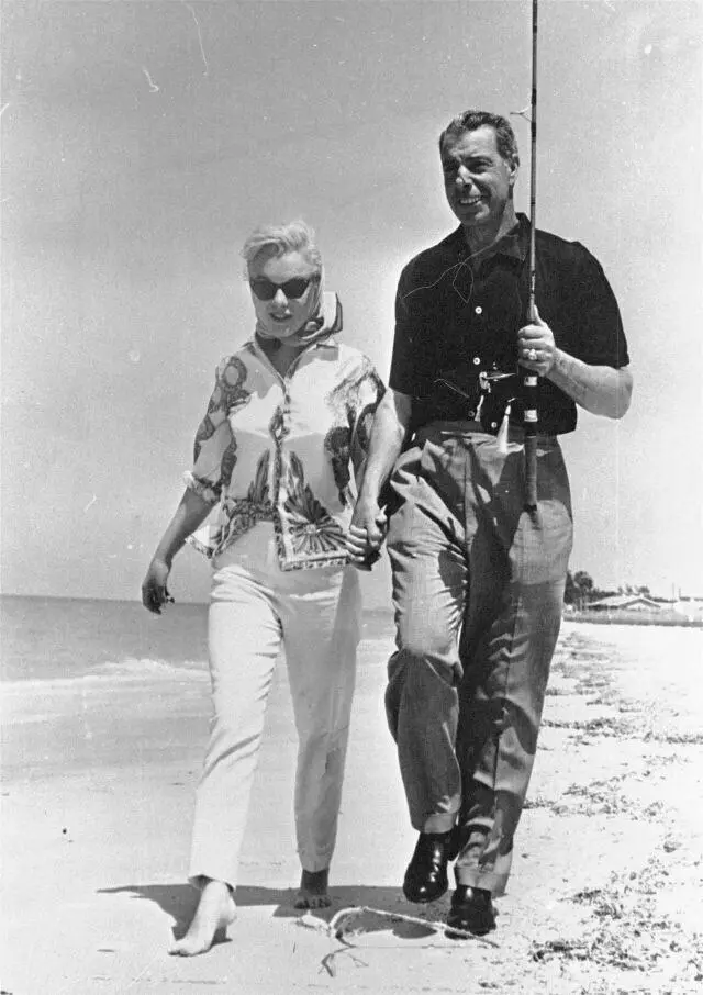 Marilyn Monroe and Joe DiMaggio Walk on the Beach