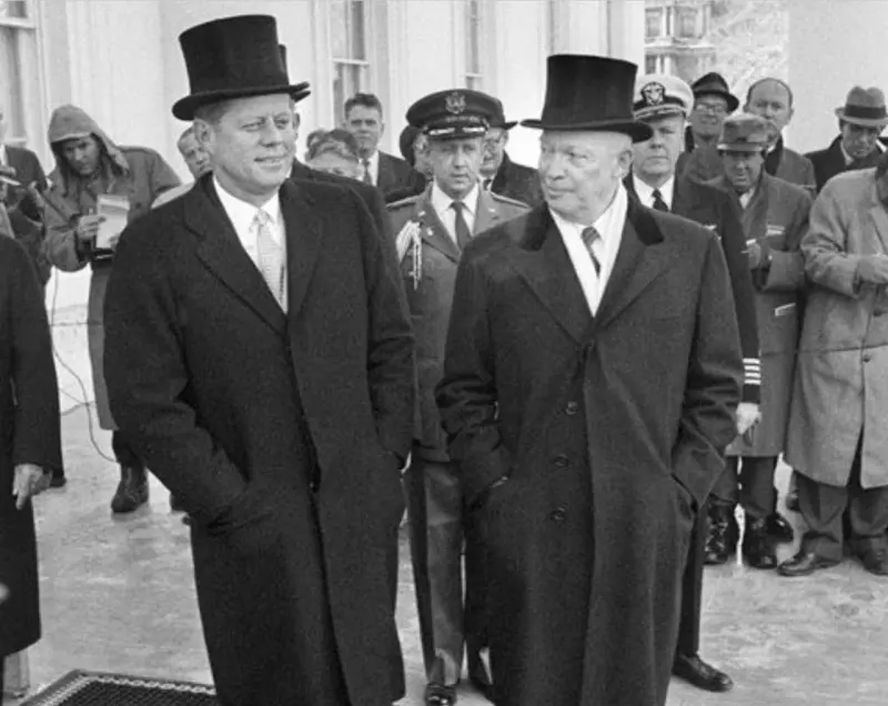 John Kennedy and Dwight Eisenhower in cylinders during Kennedy's inauguration ceremony