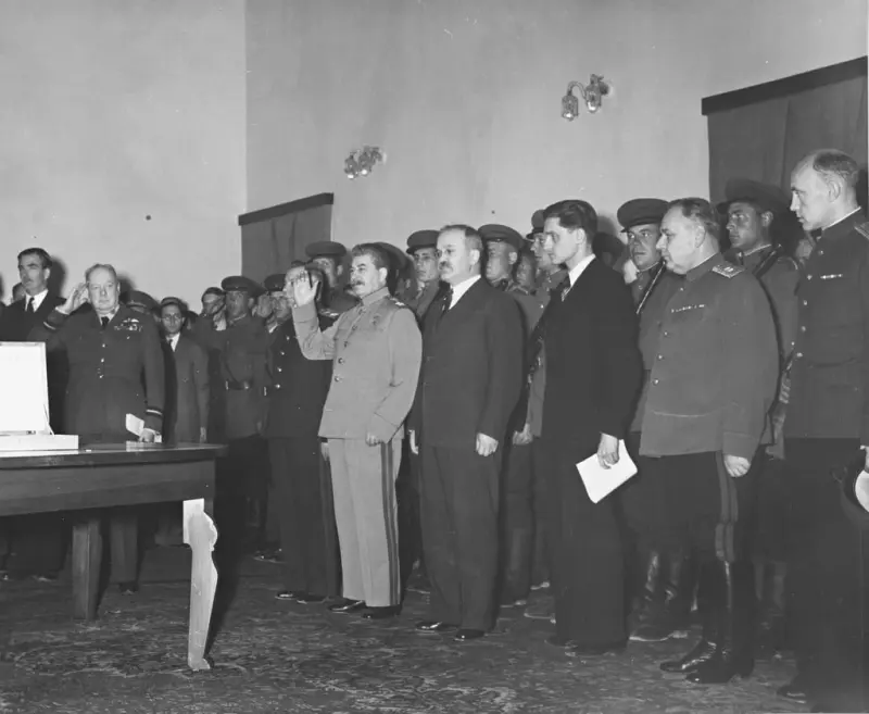 Churchill handing over the sword of honor to Stalin