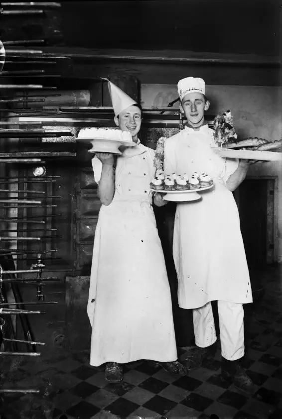 Bakers with pastries at a hotel.