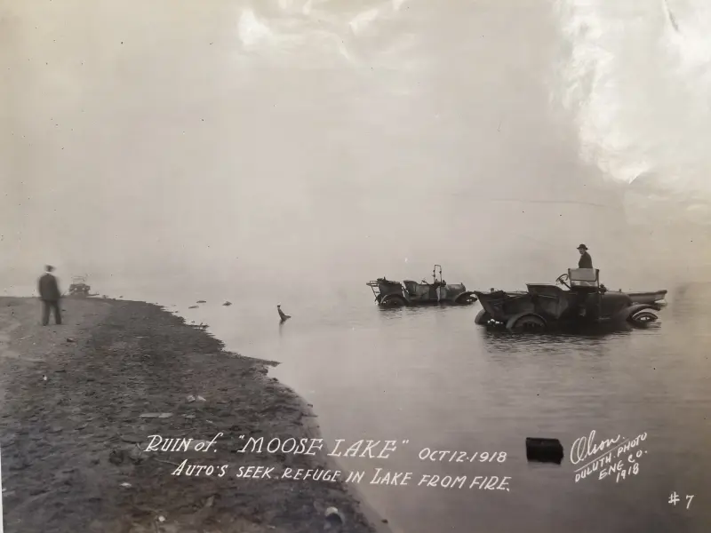 AUTOS SEEK REFUGE IN THE LAKE FROM FIRE