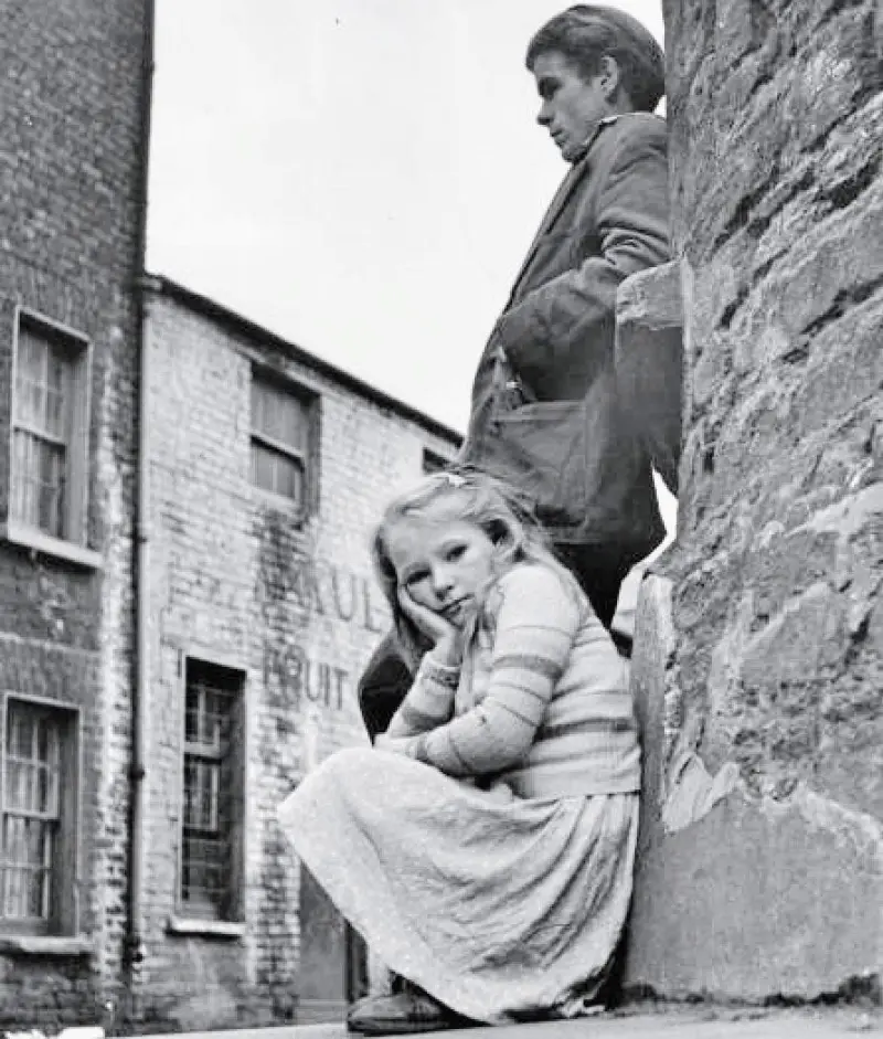 Passing time on a corner.