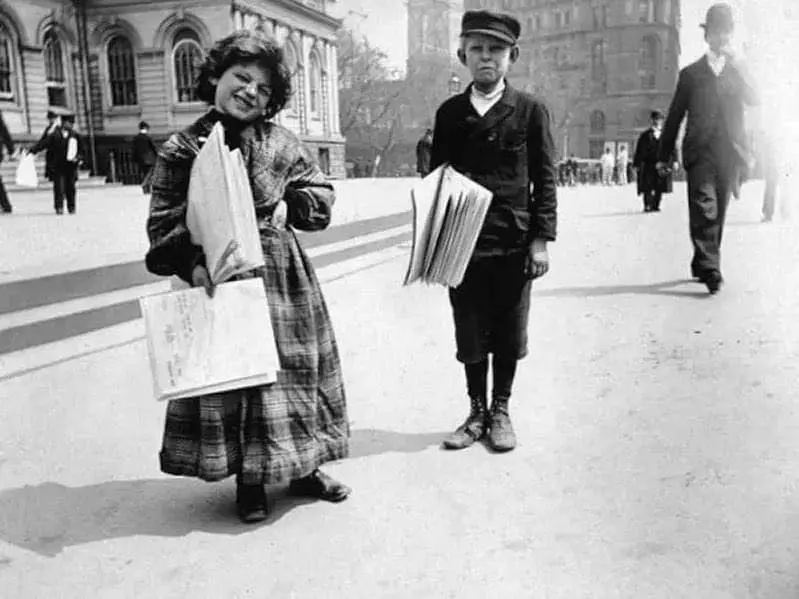 Newsgirl and newsboy in New York