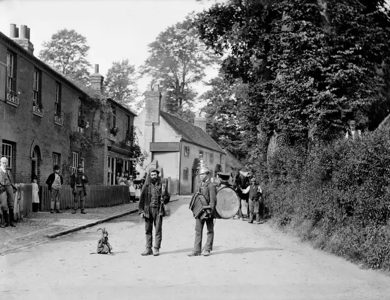 Travelling musicians with monkey