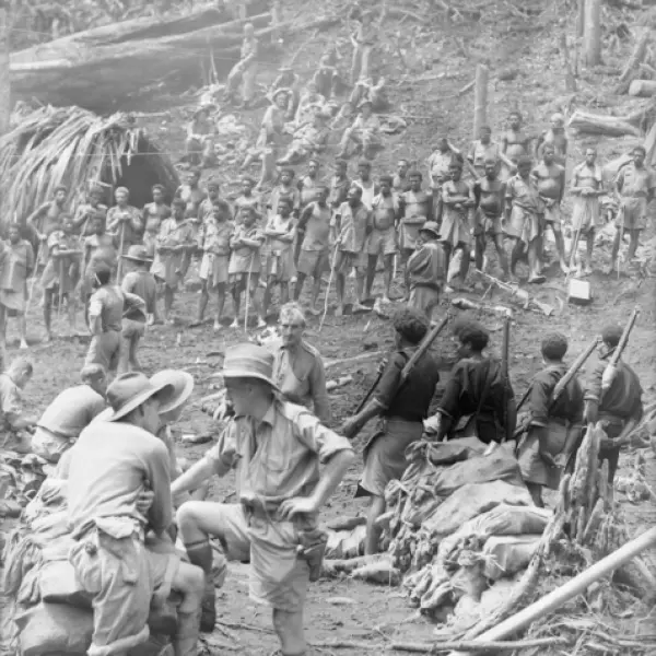 Australian soldiers and native carriers 
