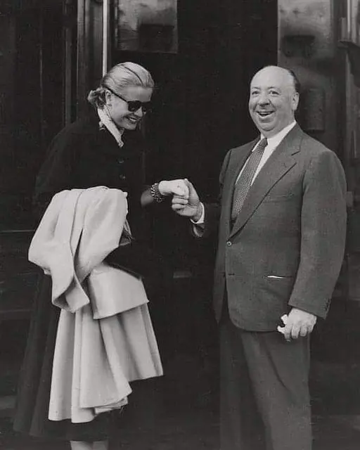 Alfred Hitchcock welcomes Grace Kelly at the train station for Film Festival