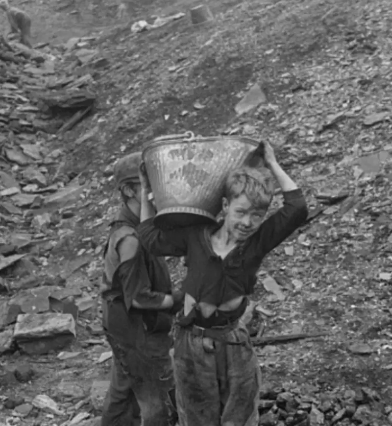 Young boys salvaging coal from the slag heaps
