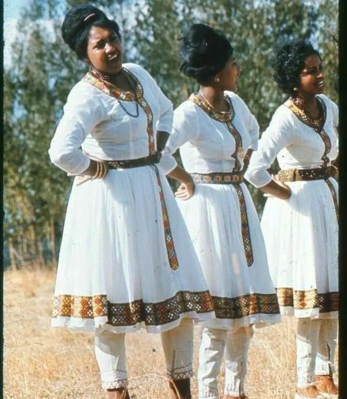 The artist smiled refreshed with her colleagues