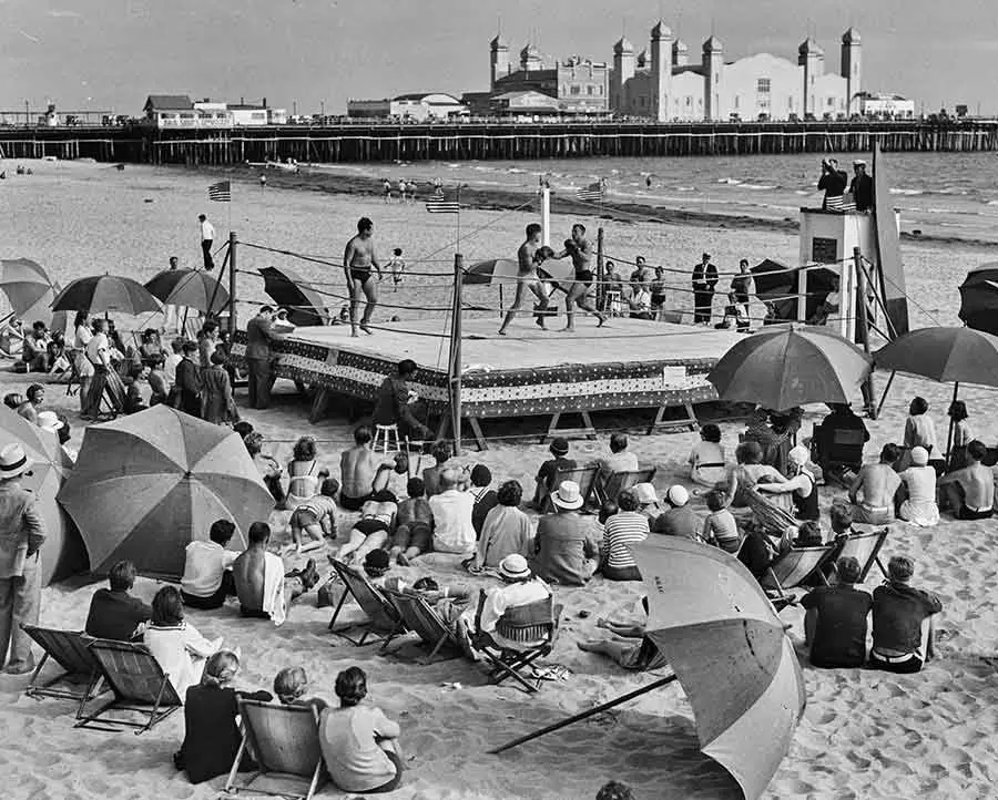 Boxers fighting in a ring