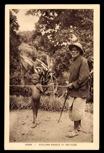 Old blind man with guide