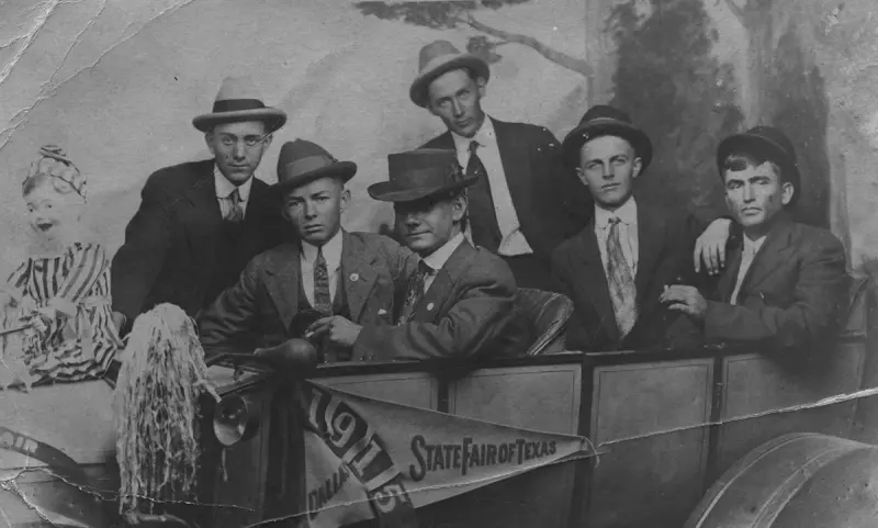 Men in a Touring Car with State Fair