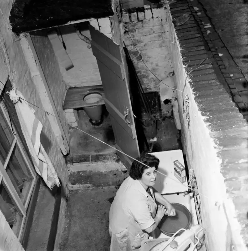 A housewife washing clothes