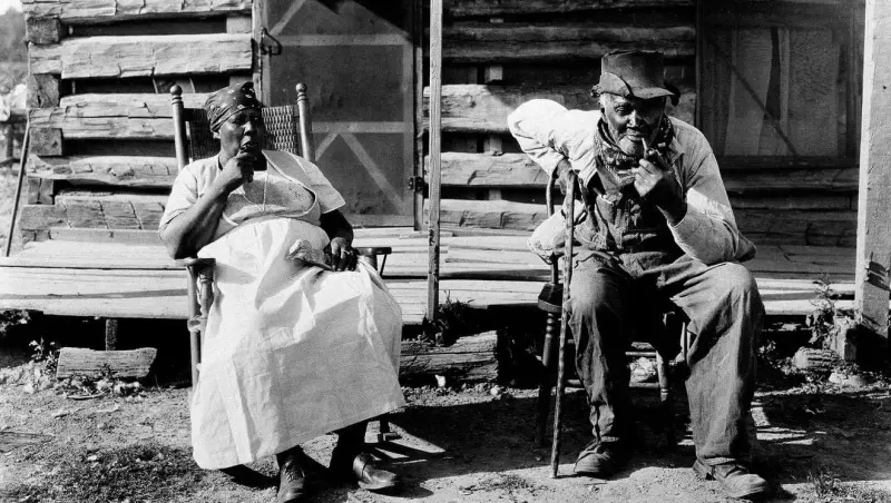 Older couple rest on their porch