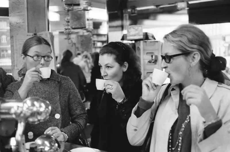 Marina Vladi at a Café in Paris with Sisters