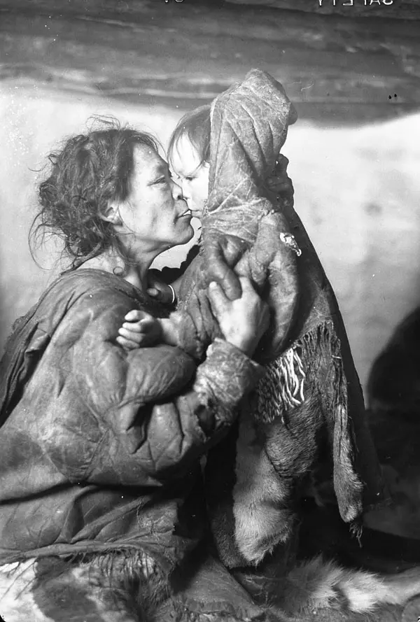 Padluk with one of her four children