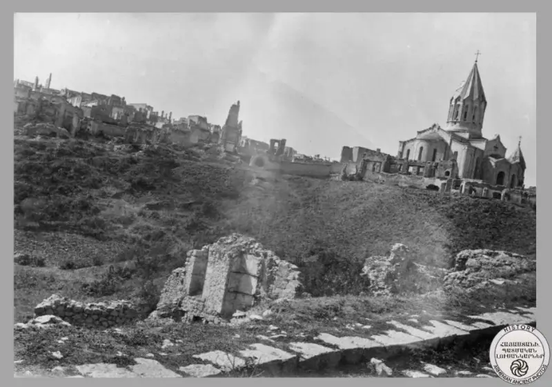 The Church of the Holy Most Redeemer Ghazanchetsov in Shushi and the ruins of burnt neighborhoods