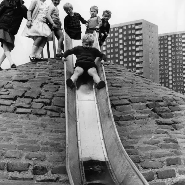 Sliding down a metal slide