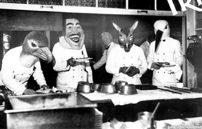 Waiters at a carnival dinner at a Bavarian diner