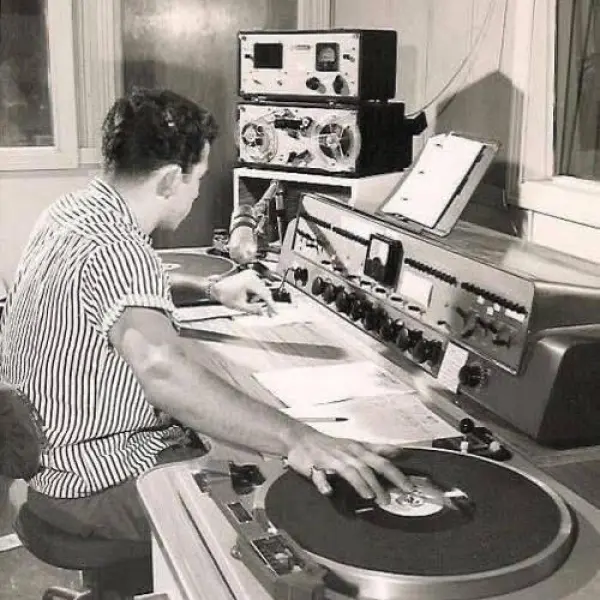 A disc jockey at work 