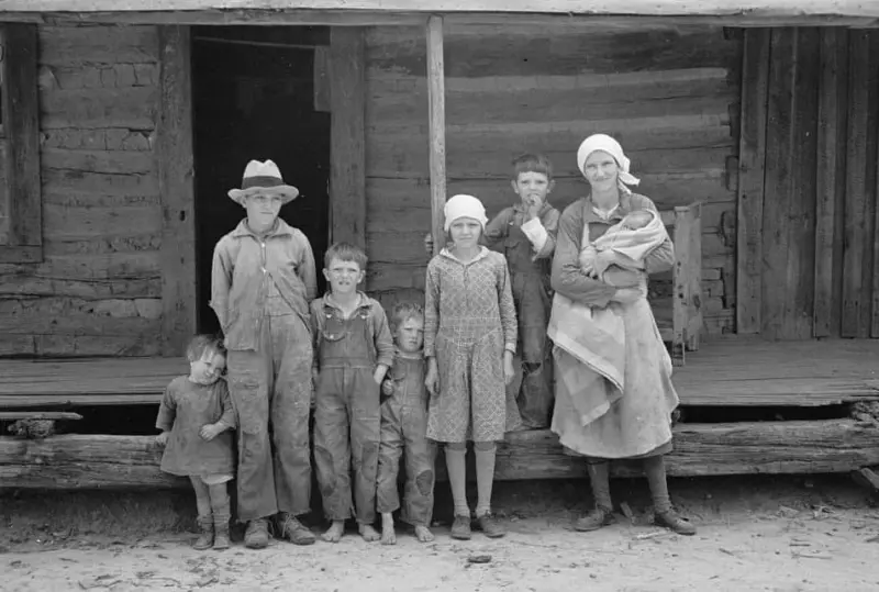 A family poses at their home