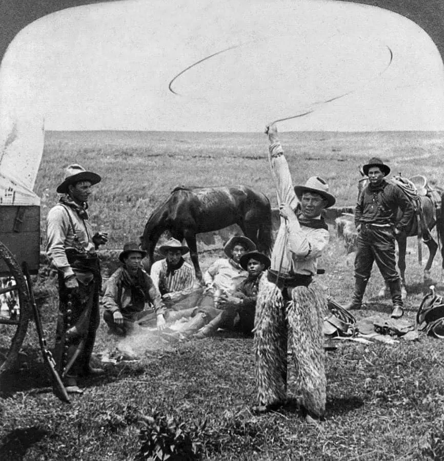 A cowboy shows off his roping skills