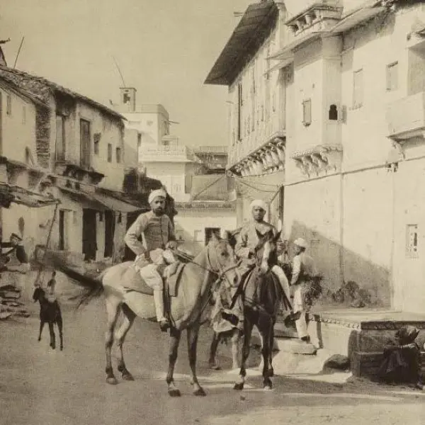 Street with horsemen