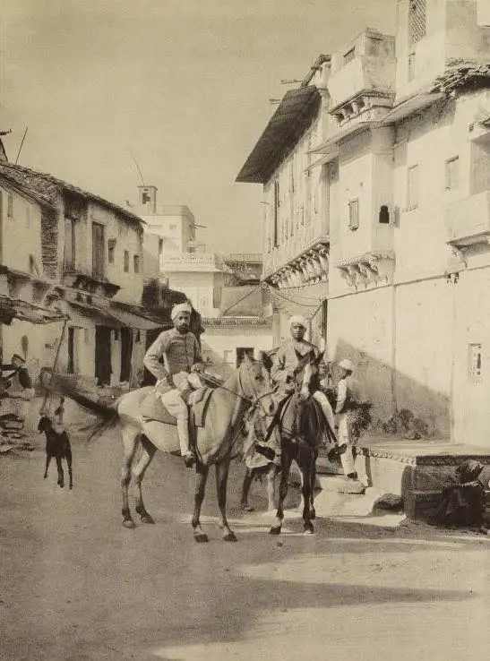 Street with horsemen