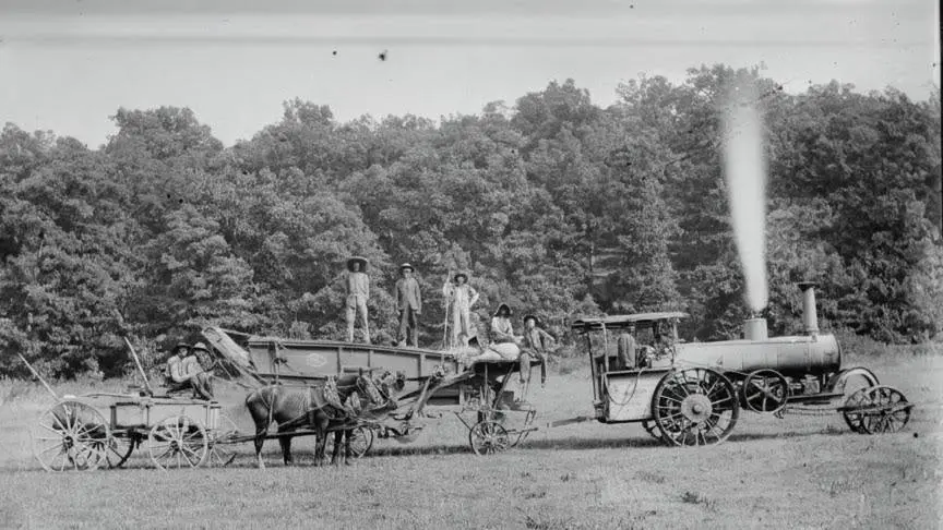 Farm crew with steam tractor