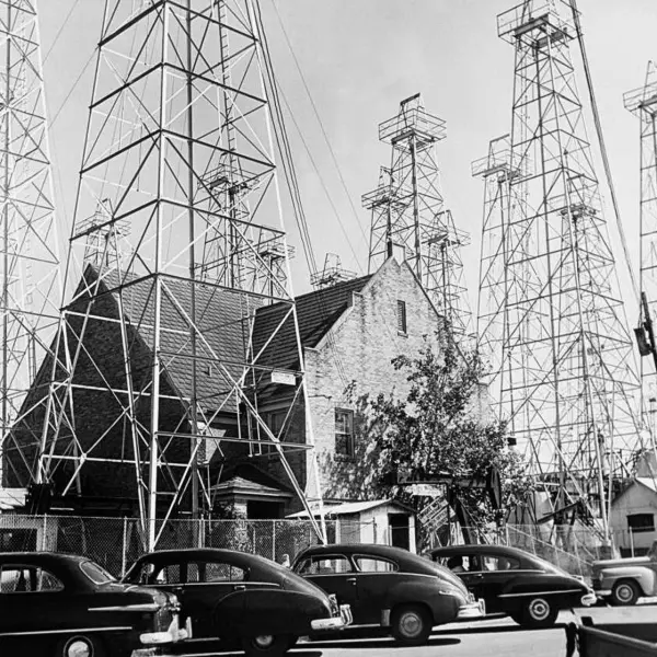 A church surrounded by derricks