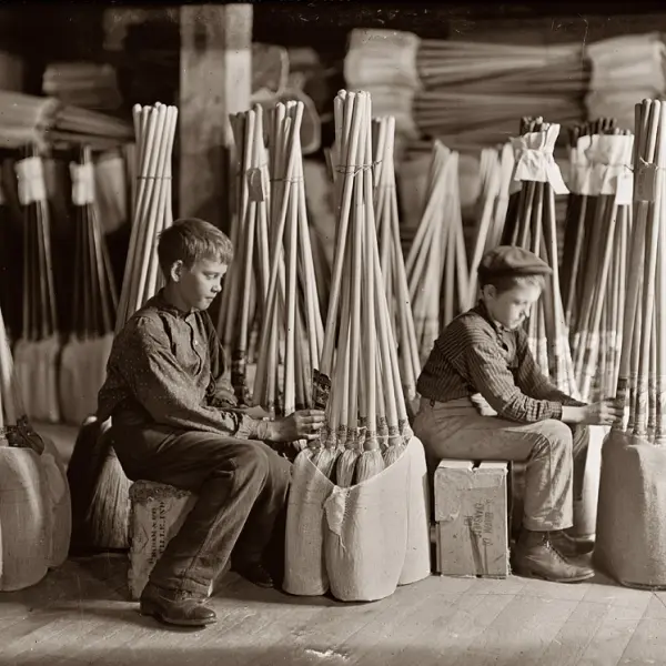 Boys with brooms 