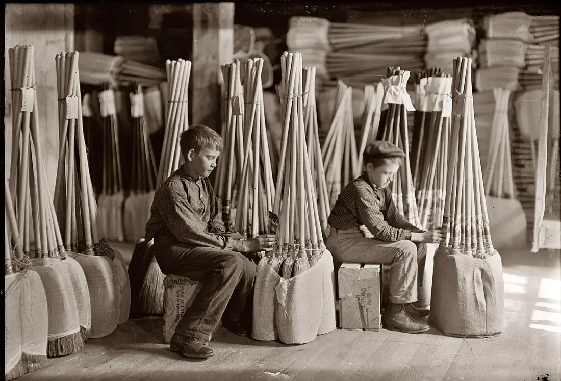 Boys with brooms 