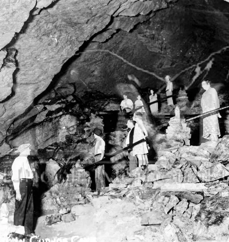 A group touring Cudjo's Cave