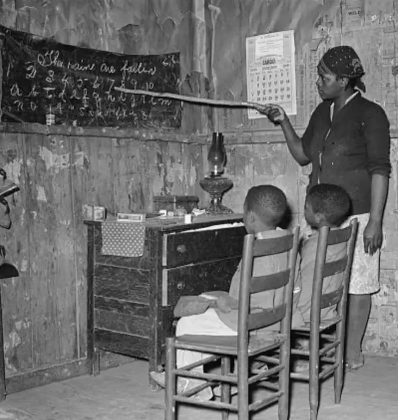 A mother teaching her children