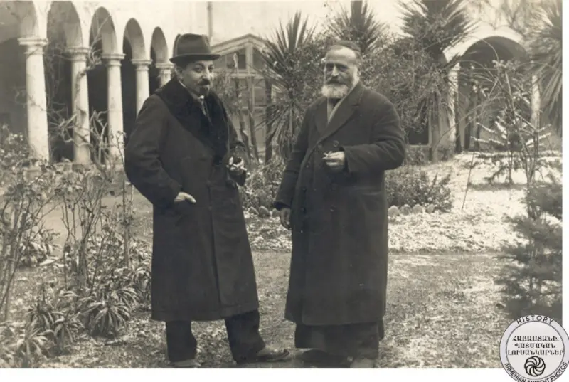 Avetik Isahakyan and Father Ghazikyan talking in the courtyard of the Saint Ghazar Monastery