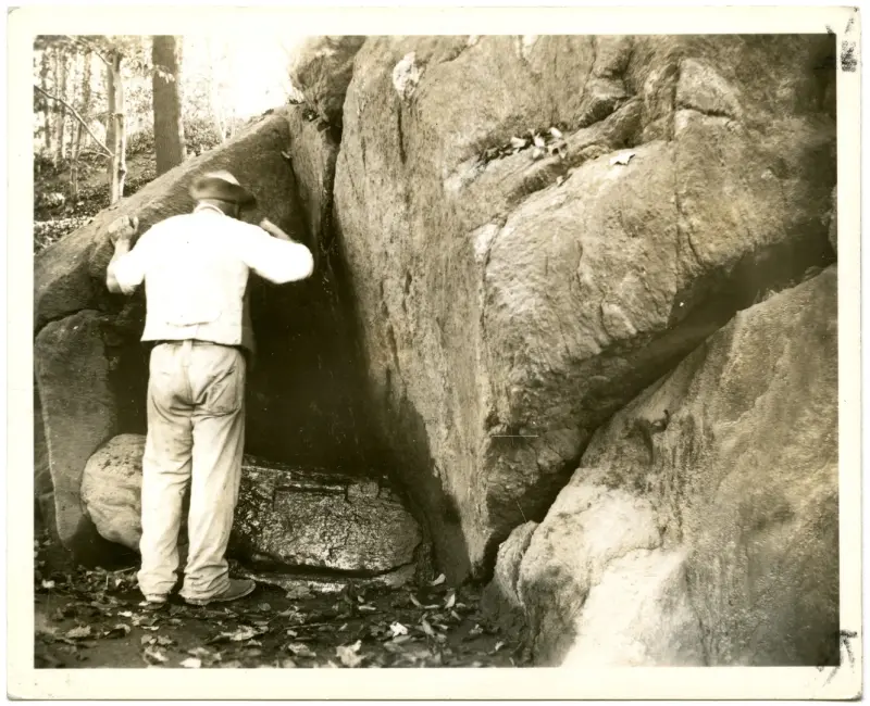 Unidentified man drinking from the spring at W. 110th Street, Central Park, 50 feet west of Seventh Avenue