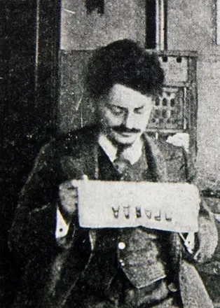 Trotsky reading Pravda
