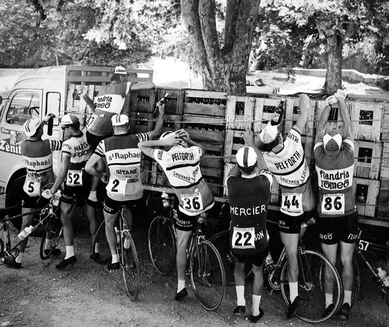 Racers Dismantling Beer from a Truck
