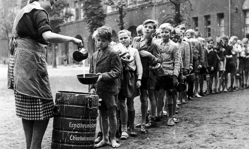 German Students in Line for Porridge