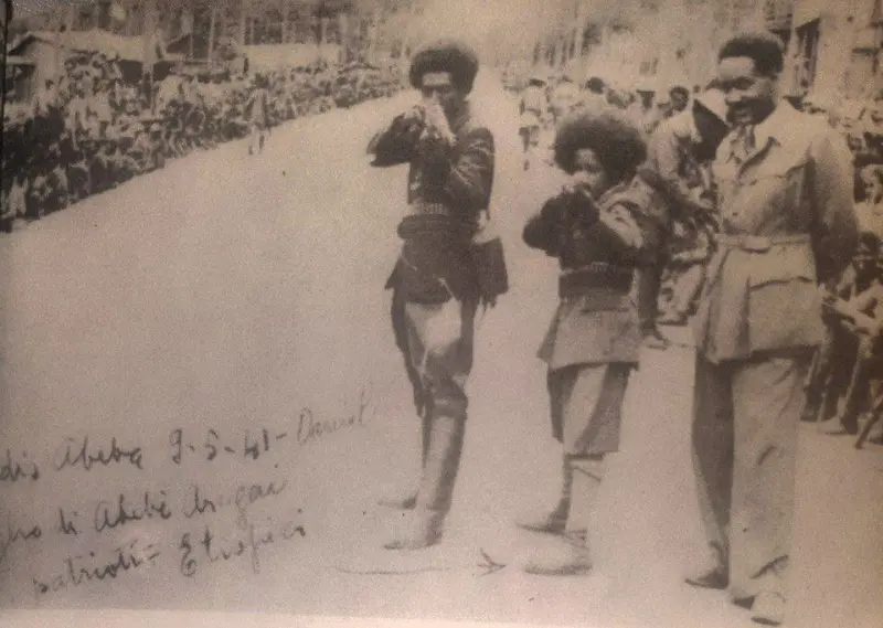 Dr Alämäwärg Bäyyäna in a victory parade with Daniel Abbaba