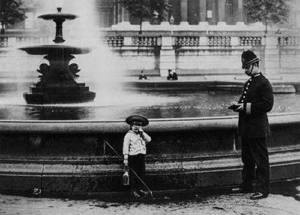 A Boy Fishing in the Fountain