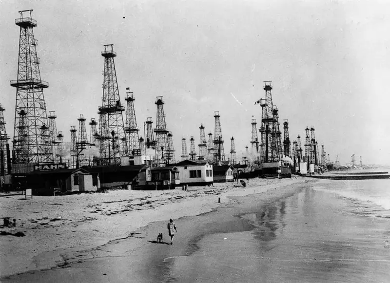 Oil derricks line the coast 