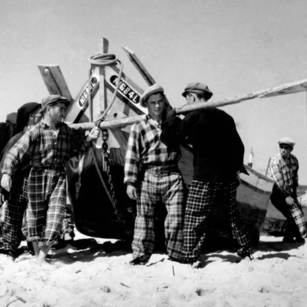 Pescadors a la platja.