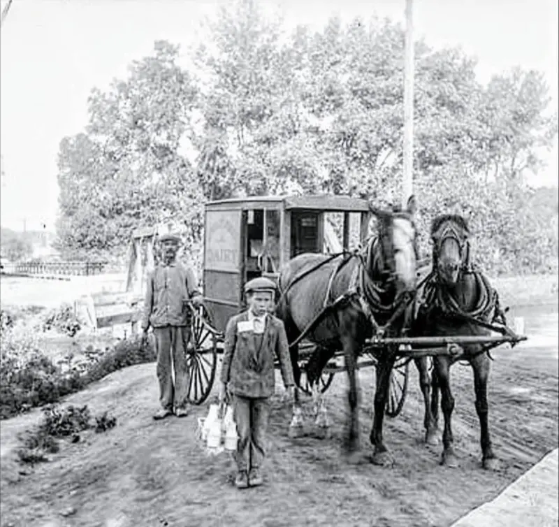 A milkman and his assistant