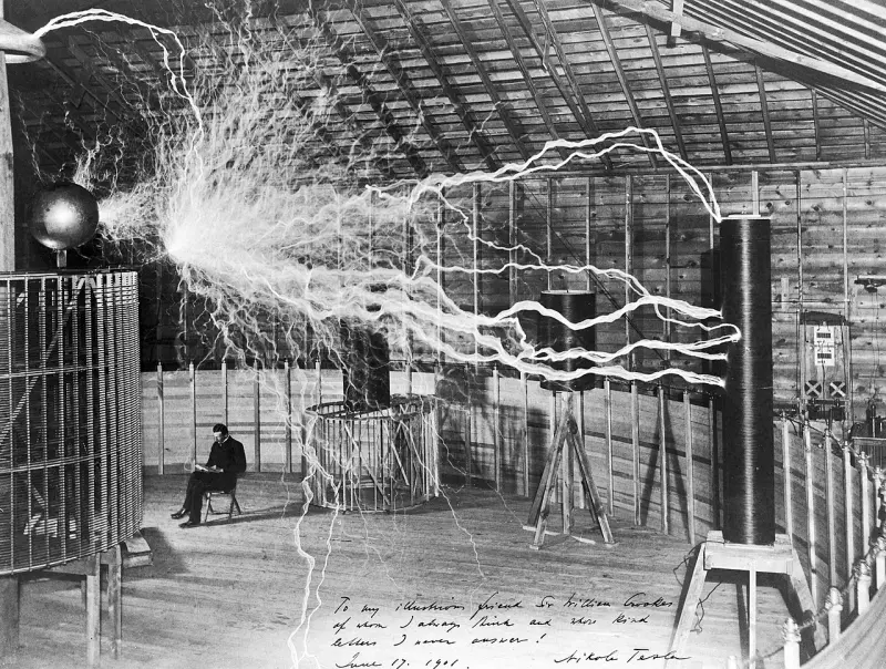 Nikola Tesla in his laboratory